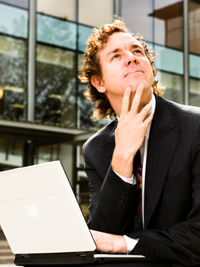 Screenshot of man and laptop