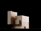 Photograph of bass wood cube model with shifted portions of the cube.