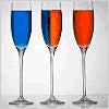 Photo of three glasses of liquid, one blue, one orange, and one vertically split between the two colors.