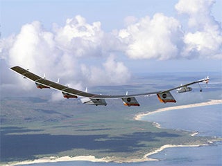 The Helios Prototype solar-electric flying wing in the sky.