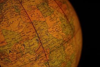 Close up photograph of globe, showing Africa. 