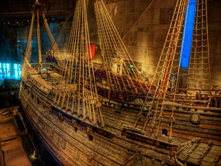 Photo of starboard side of the Swedish warship Vasa with carved statue detail.