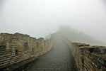 Fog surrounds the Great Wall.