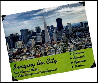 An adapted version of the poster from the class showing a photograph of a city skyline.