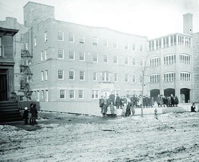 A photograph shows Hull House in Chicago