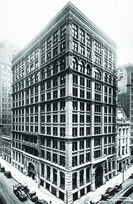 A photograph shows the Home Insurance Building in Chicago